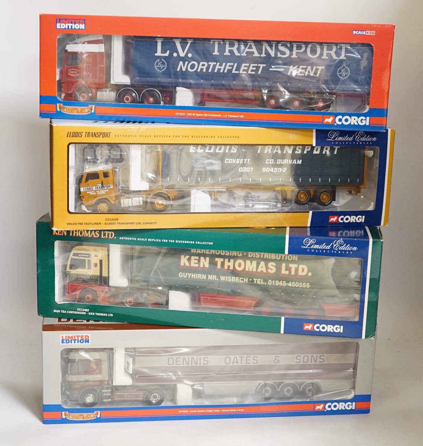 Four boxed Corgi 1:50 scale articulated trucks; a DAF XF Space Cab Curtainside lorry (CC13227), a MAN TGA curtainside lorry (CC13403), a Scania Topline with Fridge Trailer (CC12929) and a Volvo F88 Tautliner curtainside